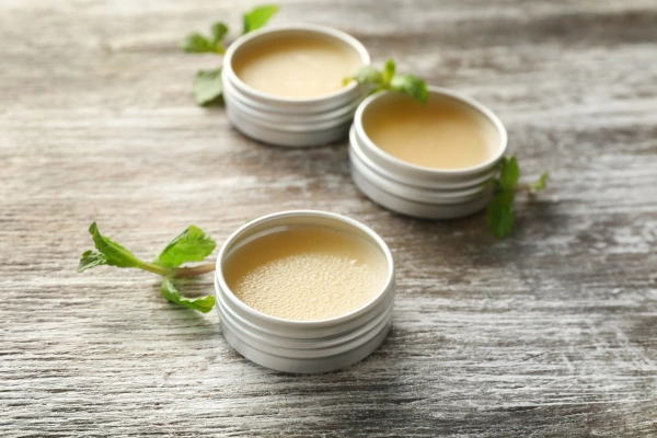Benefits & History of Castor Oil + Salve Recipe